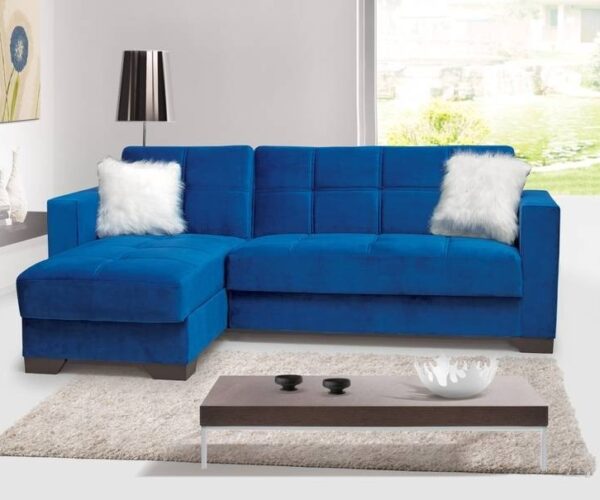 Merlin Royal Blue Plush Velvet Sofa Bed With White Fluffy Pillows